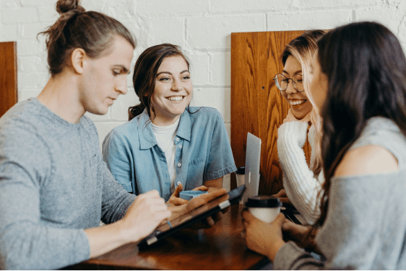 A team collaborating at a desk