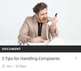 Screenshot of a training module from Academy point showing a man shouting at a phone. This module is to help colleagues handle complaints.